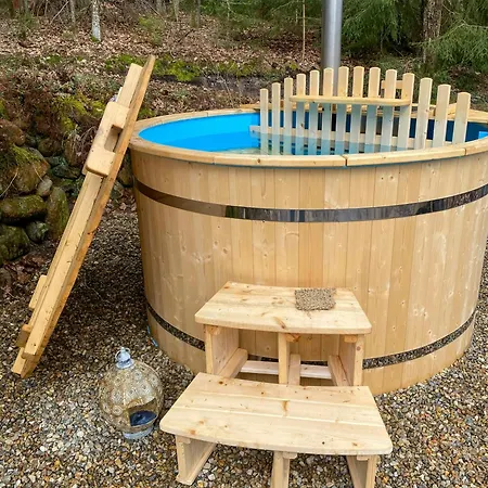 Sculptural House With Sauna By Thorso